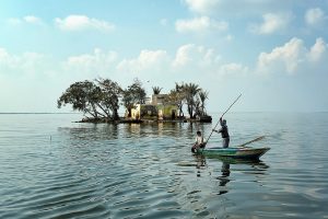 Fishers_and_small_island_in_Lake_Burullus_-_Egypt